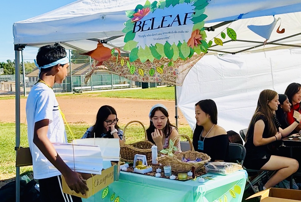 During the trade game, merchants go to different booths in hopes of trading for their needed items.