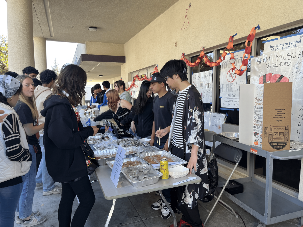 Some students were in charge of running the food stalls outside that sold hot and savory foods.