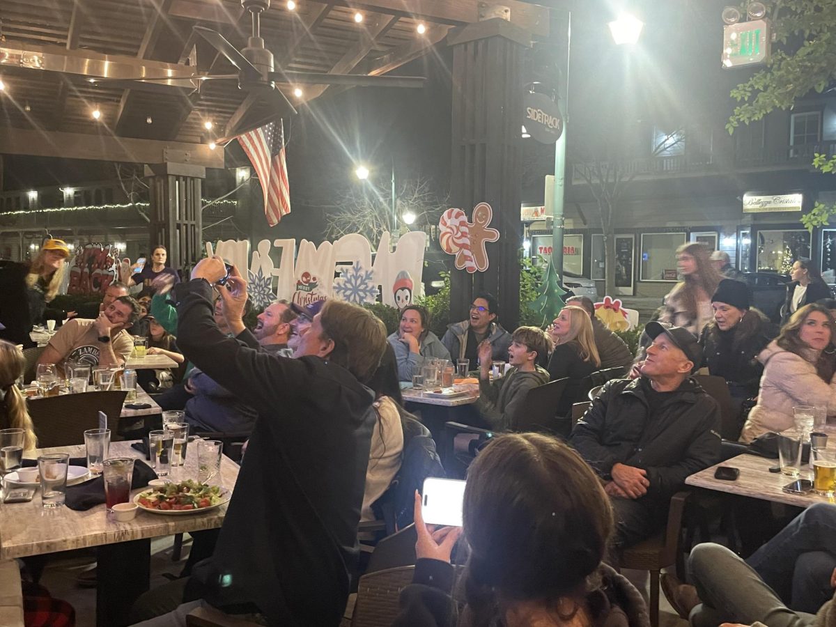 The outdoor patio gets loud when the Dons score a touchdown to get on the board.