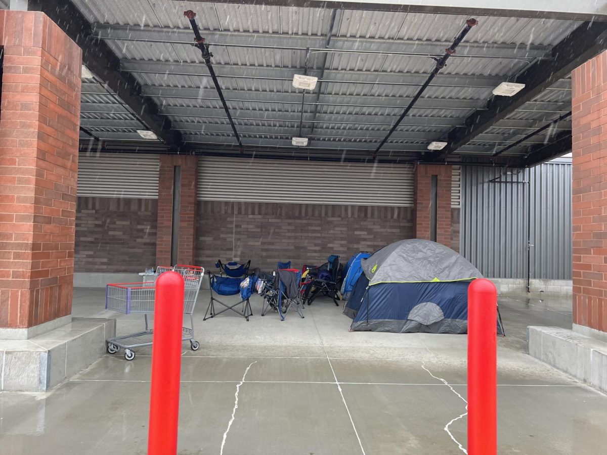 Outside the main entrance, shoppers have started to camp outside the building to be the first ones in line.